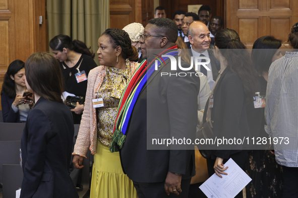 South African Ambassador to the Netherlands Vusimuzi Madonsela and members of the delegation are sitting in the courtroom. The UN top court,...