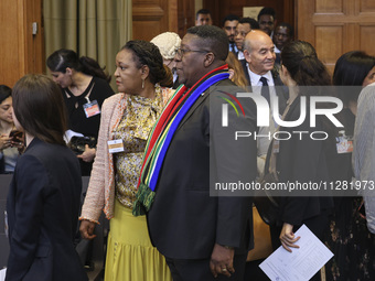 South African Ambassador to the Netherlands Vusimuzi Madonsela and members of the delegation are sitting in the courtroom. The UN top court,...