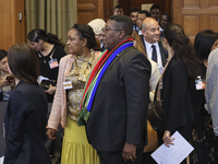 South African Ambassador to the Netherlands Vusimuzi Madonsela and members of the delegation are sitting in the courtroom. The UN top court,...