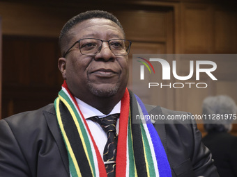 South African Ambassador to the Netherlands Vusimuzi Madonsela and members of the delegation are sitting in the courtroom. The UN top court,...