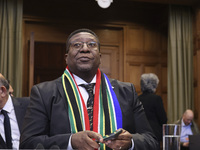 South African Ambassador to the Netherlands Vusimuzi Madonsela and members of the delegation are sitting in the courtroom. The UN top court,...