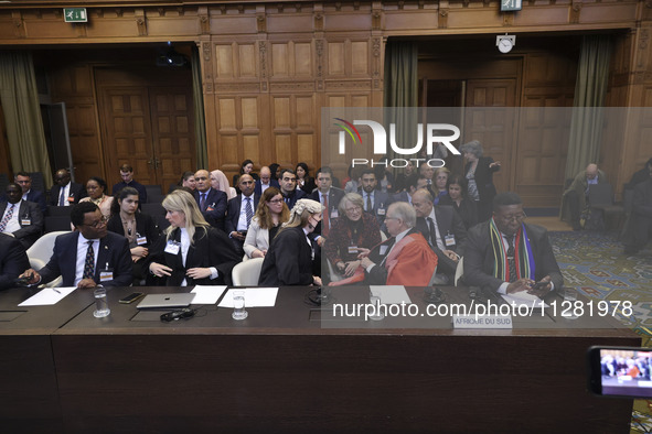 South African Ambassador to the Netherlands Vusimuzi Madonsela and members of the delegation are sitting in the courtroom. The UN top court,...