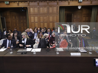 South African Ambassador to the Netherlands Vusimuzi Madonsela and members of the delegation are sitting in the courtroom. The UN top court,...