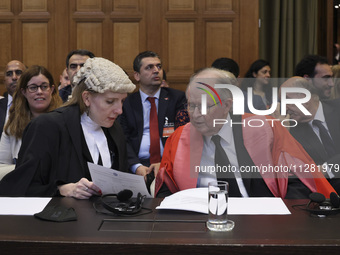 The South African delegation is in the courtroom. The UN top court, the International Court of Justice (ICJ), in The Hague, the Netherlands,...