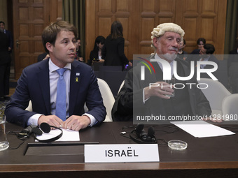 Members of the Israeli delegation are sitting in the courtroom. The UN top court, the International Court of Justice (ICJ) in The Hague, the...