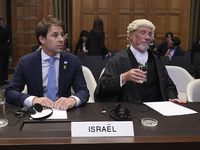 Members of the Israeli delegation are sitting in the courtroom. The UN top court, the International Court of Justice (ICJ) in The Hague, the...