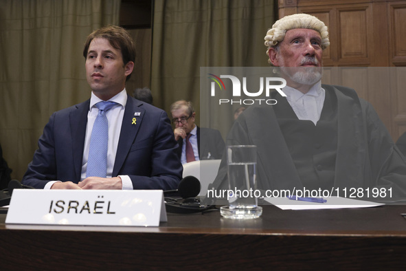 Members of the Israeli delegation are sitting in the courtroom. The UN top court, the International Court of Justice (ICJ) in The Hague, the...