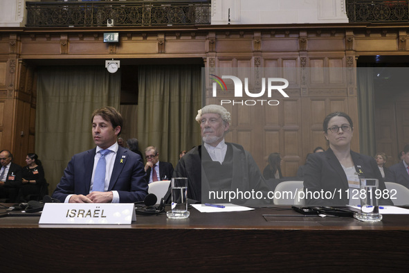 Members of the Israeli delegation are sitting in the courtroom. The UN top court, the International Court of Justice (ICJ) in The Hague, the...