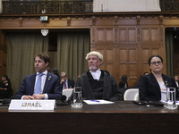 Members of the Israeli delegation are sitting in the courtroom. The UN top court, the International Court of Justice (ICJ) in The Hague, the...