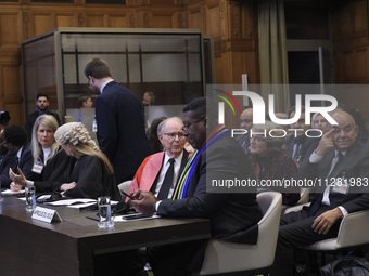 The South African delegation is in the courtroom. The UN top court, the International Court of Justice (ICJ), in The Hague, the Netherlands,...