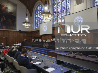 The body of the judges is sitting while the session is starting. The UN top court, the International Court of Justice (ICJ) in The Hague, th...