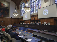 The body of the judges is sitting while the session is starting. The UN top court, the International Court of Justice (ICJ) in The Hague, th...