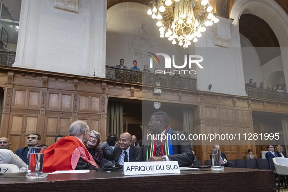 South African Ambassador to the Netherlands Vusimuzi Madonsela and members of the delegation are sitting in the courtroom. The UN top court,...