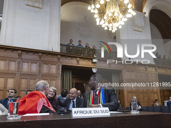 South African Ambassador to the Netherlands Vusimuzi Madonsela and members of the delegation are sitting in the courtroom. The UN top court,...