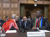 South African Ambassador to the Netherlands Vusimuzi Madonsela and members of the delegation are sitting in the courtroom. The UN top court,...