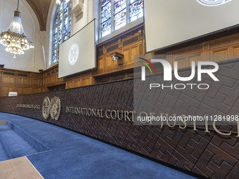 The International Court of Justice logo and inscription are appearing in the courtroom. The UN top court, the International Court of Justice...