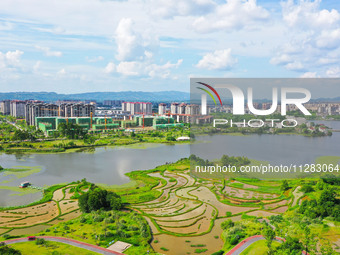 The Shuangguihu Lake National Wetland Park is being seen under the blue sky and white clouds in Chongqing, China, on May 27, 2024. Recently,...