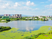 The Shuangguihu Lake National Wetland Park is being seen under the blue sky and white clouds in Chongqing, China, on May 27, 2024. Recently,...