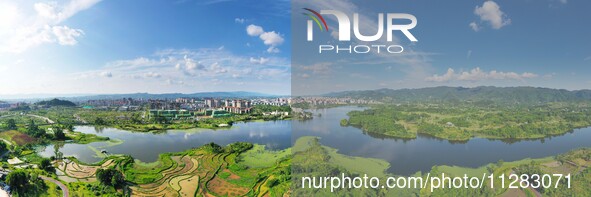 The Shuangguihu Lake National Wetland Park is being seen under the blue sky and white clouds in Chongqing, China, on May 27, 2024. Recently,...