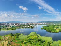 The Shuangguihu Lake National Wetland Park is being seen under the blue sky and white clouds in Chongqing, China, on May 27, 2024. Recently,...