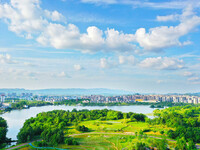 The Shuangguihu Lake National Wetland Park is being seen under the blue sky and white clouds in Chongqing, China, on May 27, 2024. Recently,...