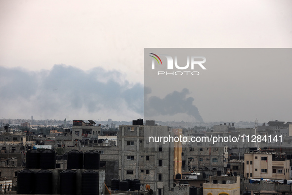 Smoke is billowing following Israeli bombardment in Rafah, in the southern Gaza Strip, on May 28, 2024, amid the ongoing conflict between Is...