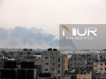 Smoke is billowing following Israeli bombardment in Rafah, in the southern Gaza Strip, on May 28, 2024, amid the ongoing conflict between Is...