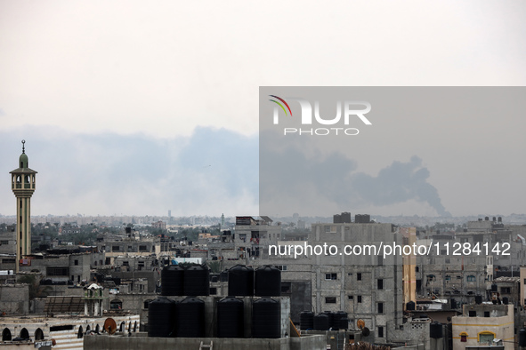 Smoke is billowing following Israeli bombardment in Rafah, in the southern Gaza Strip, on May 28, 2024, amid the ongoing conflict between Is...