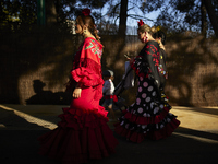 Women are dressing in typical flamenco dresses during the festivities of the Corpus Christi in Granada, Spain, on May 28, 2024. The Corpus C...