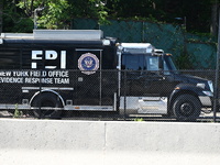 An FBI truck is seen. FBI vehicles are parked in front of a business for an unknown reason in Elmwood Park, New Jersey, United States, on Ma...