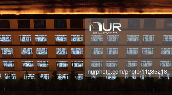 Senior three students, who are about to take the National College entrance examination, are studying by themselves at night at Fengfeng No 1...