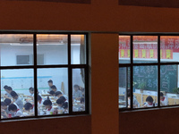 Senior three students, who are about to take the National College entrance examination, are studying by themselves at night at Fengfeng No 1...