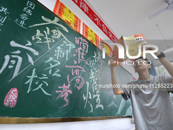 Senior three students, who are about to take the National College entrance examination, are studying by themselves at night at Fengfeng No 1...