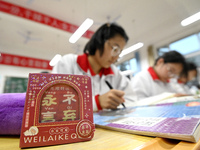 Senior three students, who are about to take the National College entrance examination, are studying by themselves at night at Fengfeng No 1...