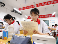 Senior three students, who are about to take the National College entrance examination, are studying by themselves at night at Fengfeng No 1...