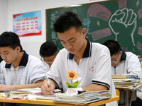 Senior three students, who are about to take the National College entrance examination, are studying by themselves at night at Fengfeng No 1...