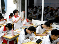 Senior three students, who are about to take the National College entrance examination, are studying by themselves at night at Fengfeng No 1...