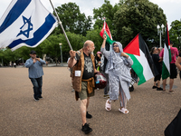 A Christian counter-protester with an Israeli flag tries unsuccessfully to provoke a fight with hundreds of people protesting in front of th...