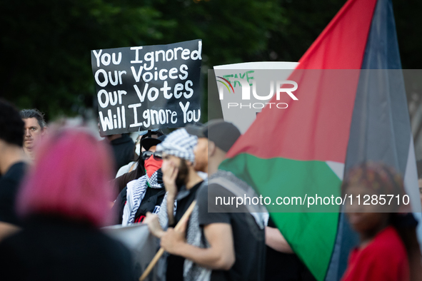 A sign urges people not to vote for President Joe Biden in the upcoming election during a protest in front of the White against the Israeli...