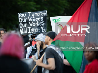 A sign urges people not to vote for President Joe Biden in the upcoming election during a protest in front of the White against the Israeli...