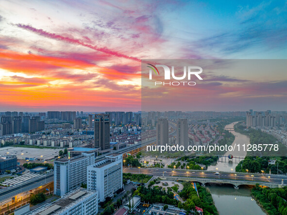 A photo is showing the North-South Geographical Boundary indication Garden in the Chaoxia district of Huai'an City, Jiangsu province, China,...