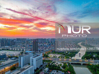 A photo is showing the North-South Geographical Boundary indication Garden in the Chaoxia district of Huai'an City, Jiangsu province, China,...