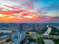 A photo is showing the North-South Geographical Boundary indication Garden in the Chaoxia district of Huai'an City, Jiangsu province, China,...