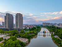 A photo is showing the North-South Geographical Boundary indication Garden in the Chaoxia district of Huai'an City, Jiangsu province, China,...