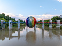 A photo is showing the North-South Geographical Boundary indication Garden in the Chaoxia district of Huai'an City, Jiangsu province, China,...