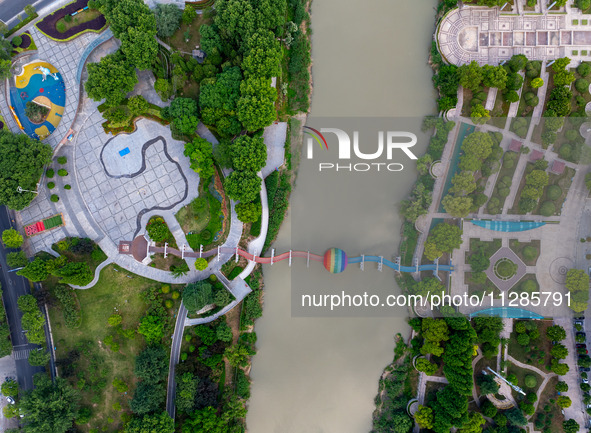 A photo is showing the North-South Geographical Boundary indication Garden in the Chaoxia district of Huai'an City, Jiangsu province, China,...