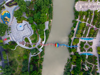 A photo is showing the North-South Geographical Boundary indication Garden in the Chaoxia district of Huai'an City, Jiangsu province, China,...