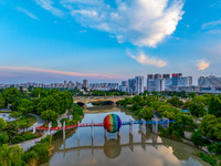 A photo is showing the North-South Geographical Boundary indication Garden in the Chaoxia district of Huai'an City, Jiangsu province, China,...