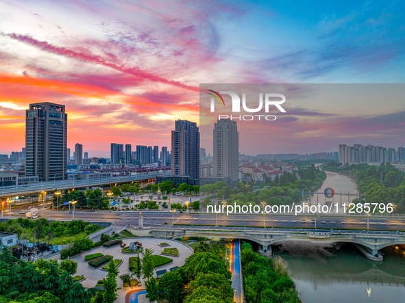 A photo is showing the North-South Geographical Boundary indication Garden in the Chaoxia district of Huai'an City, Jiangsu province, China,...