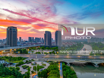 A photo is showing the North-South Geographical Boundary indication Garden in the Chaoxia district of Huai'an City, Jiangsu province, China,...